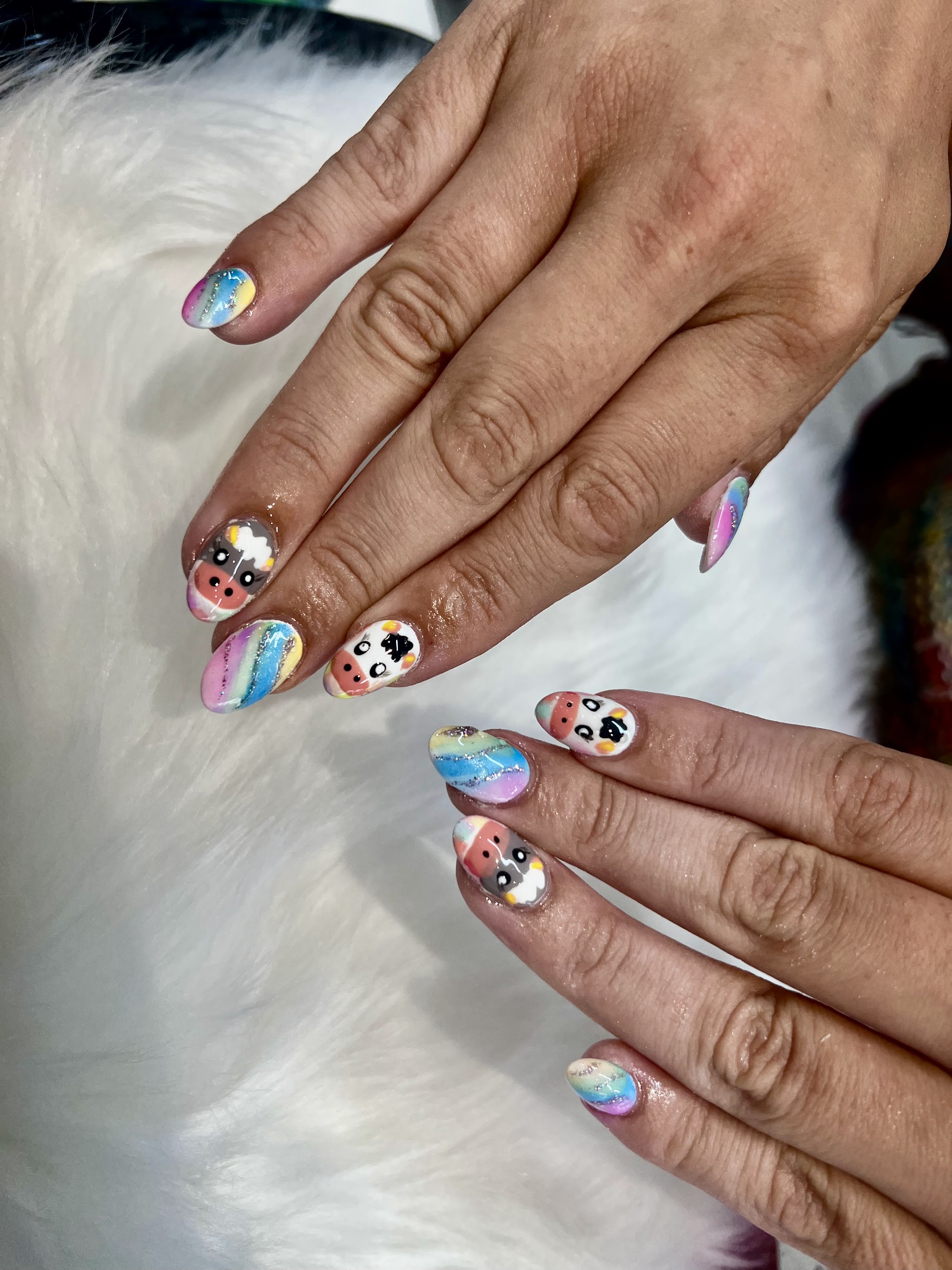 Pastel rainbow nails with hand painted character art